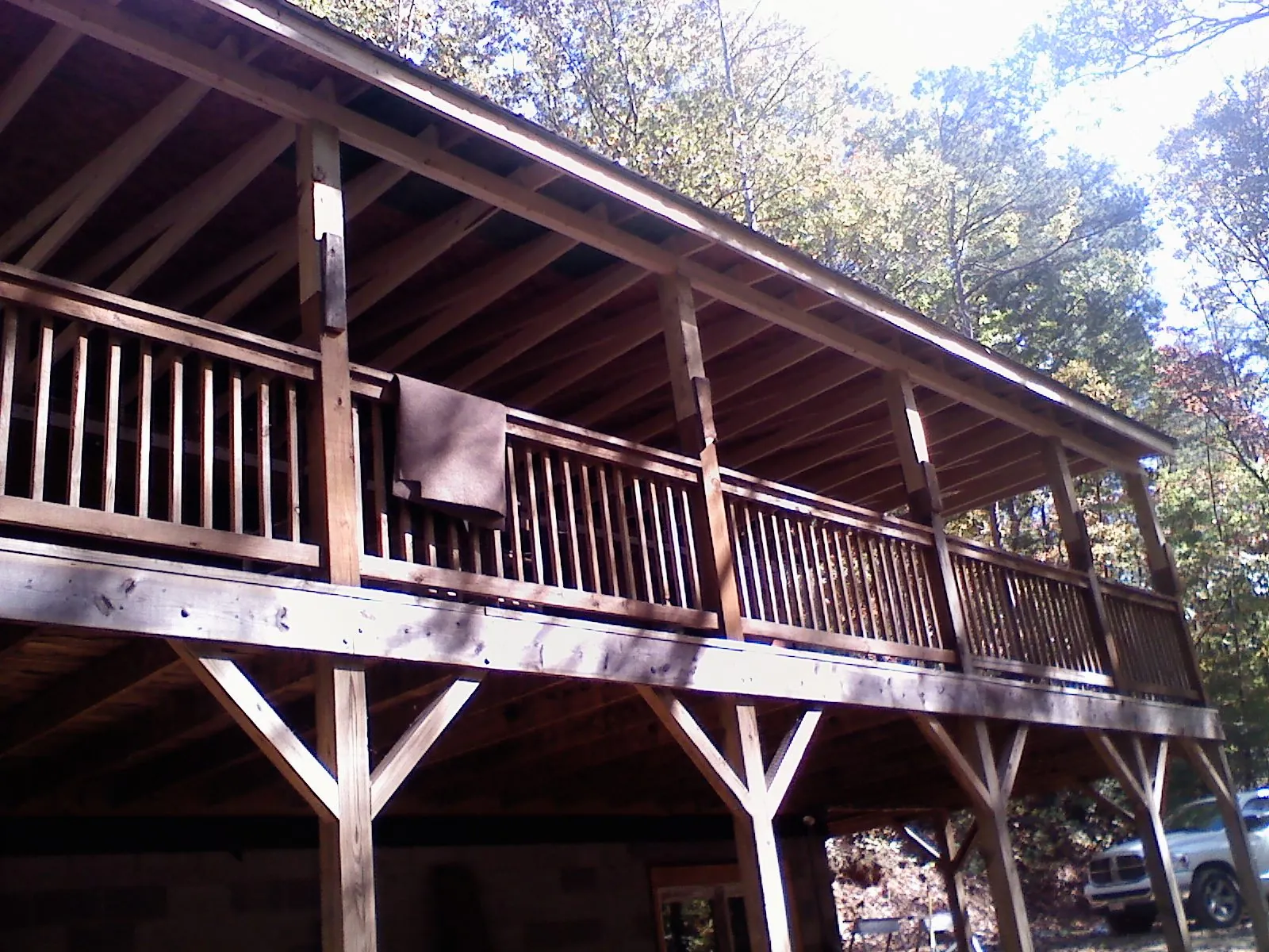 Timber framing under a new elevated porch and deck in Kenedy